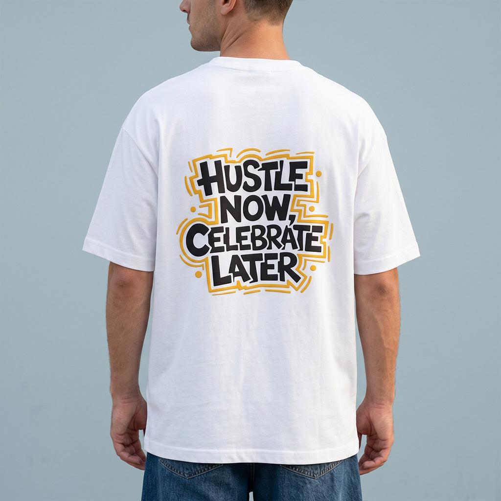 Person wearing a white t-shirt with 'Hustle Now, Celebrate Later' text on the back against a gray background
